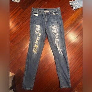 Trendy Distressed Skinny Jeans in Blue